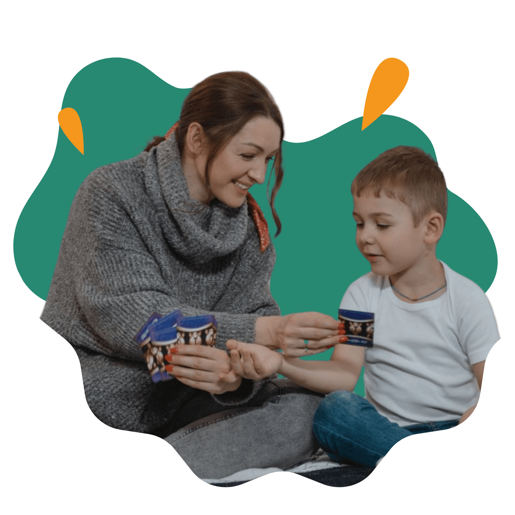 A mother and son enjoying leisure time together indoors, bonding over snacks.